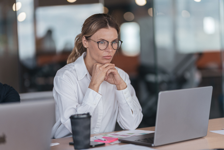 A woman researching survivor benefits.