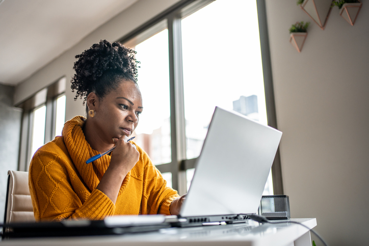 A woman researching how long she has to keep state tax returns and other documents.